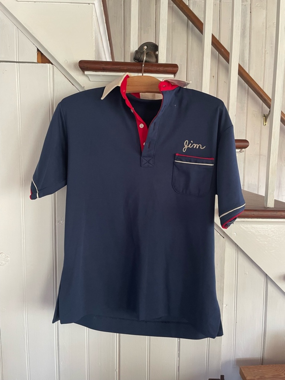 Vintage Navy Polo Shirt with Red Trim and Cream Collar